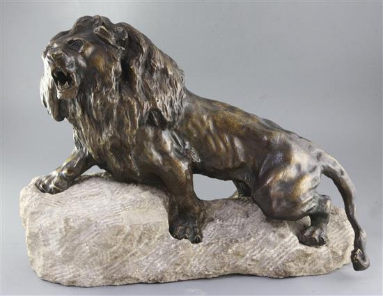 Thomas Cartier. A bronze figure of a roaring lion, width 24in. height 17in.